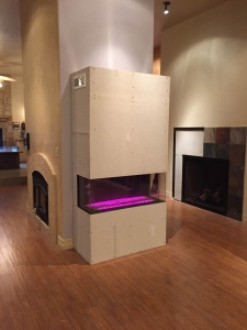 Frameless linear double corner fireplace
