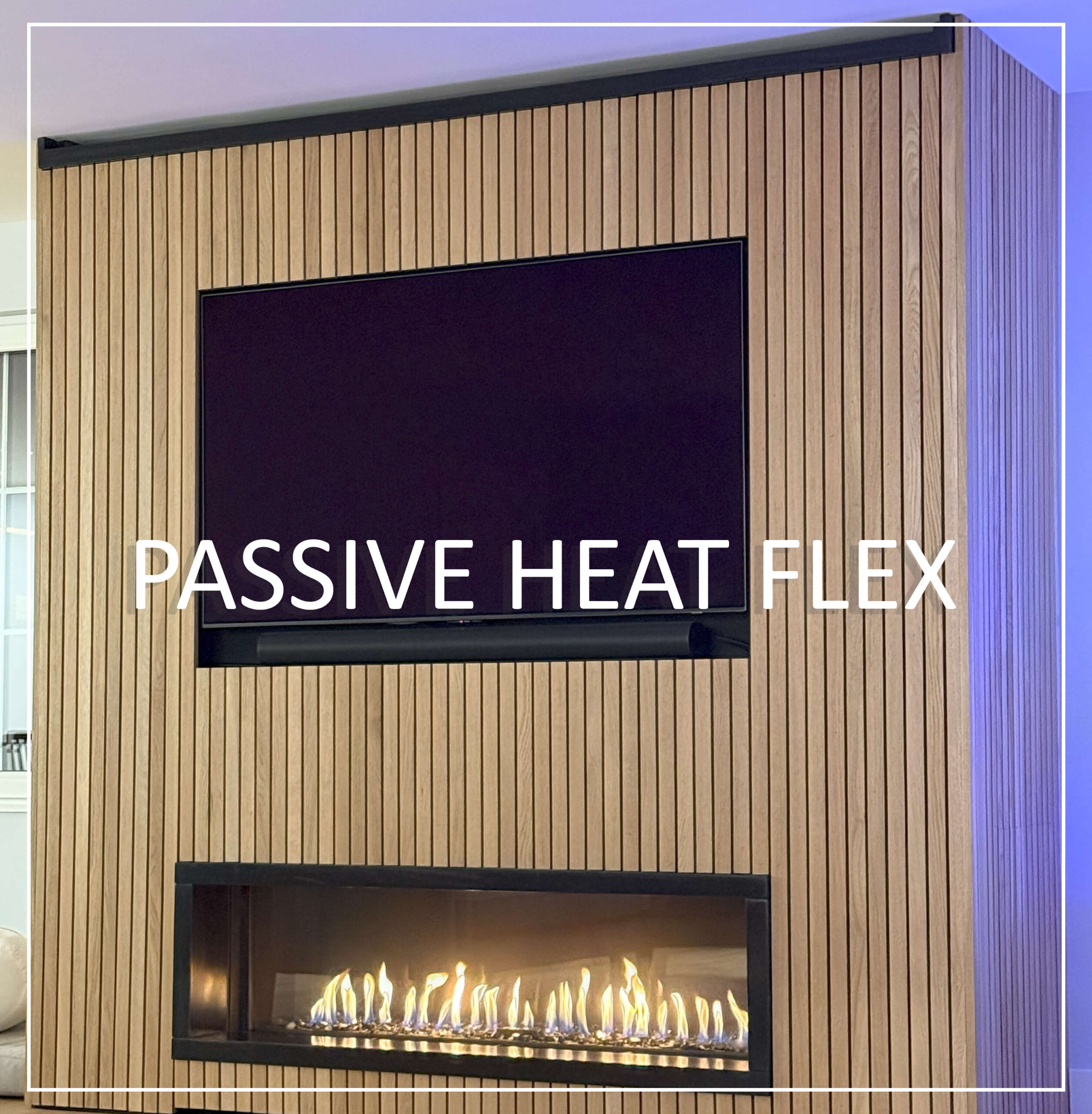 Modern indoor linear direct vent fireplace integrated within a contemporary wood-paneled wall, featuring a TV above and utilizing Passive Heat Flex heat management.