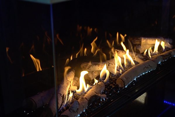 Reflective black glass interior in a Flare fireplace