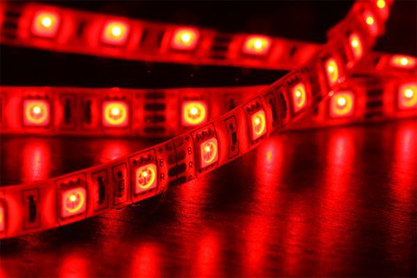 RGB LED lighting illuminating the fireplace media bed