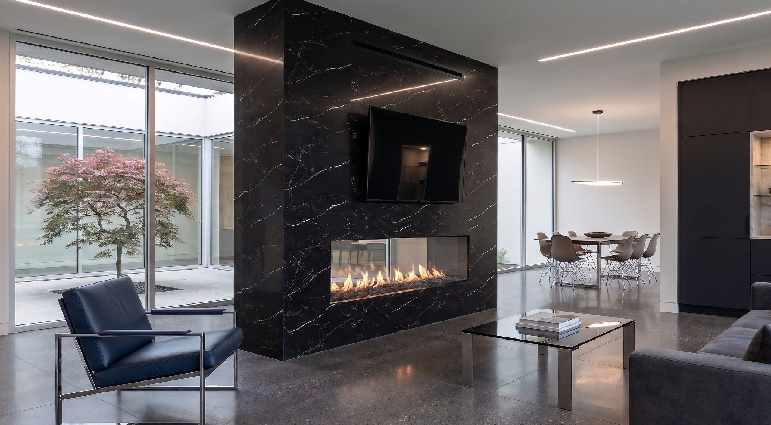 See Through 70 x 24 gas fireplace in a modern black marble feature wall