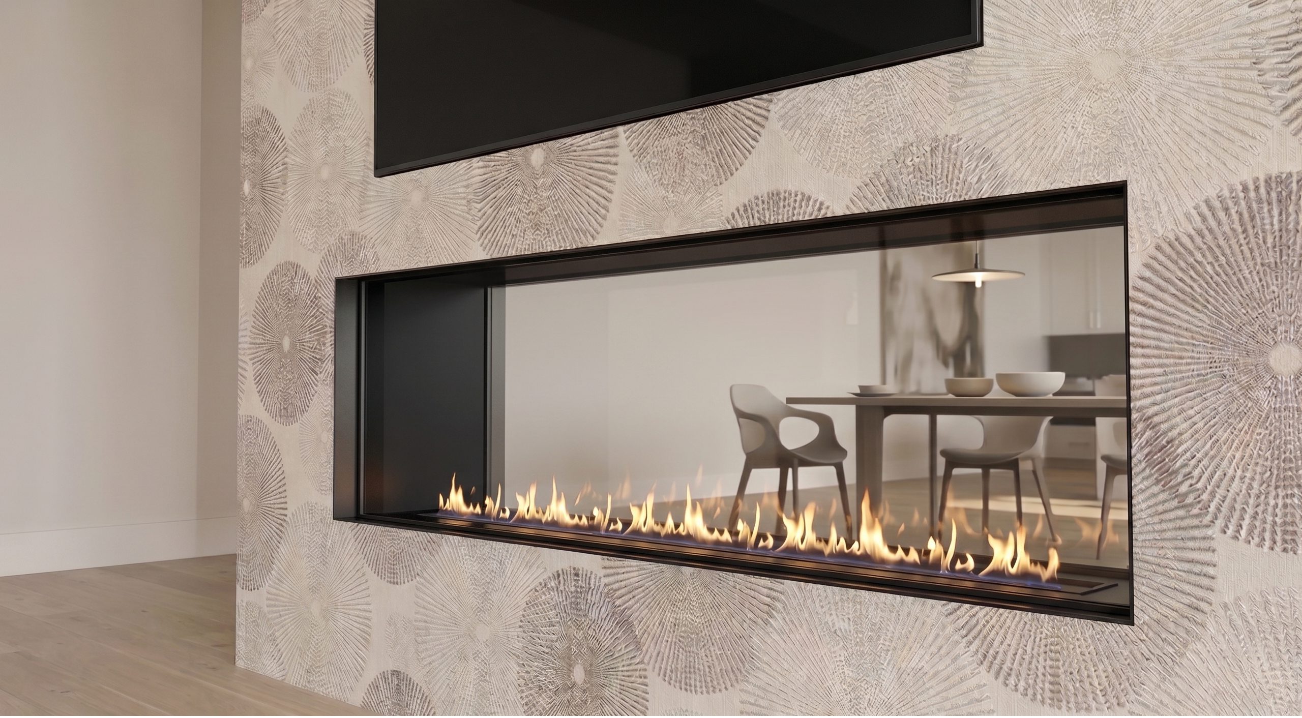 See Through 100 x 30 gas fireplace in a modern textured feature wall beneath a television